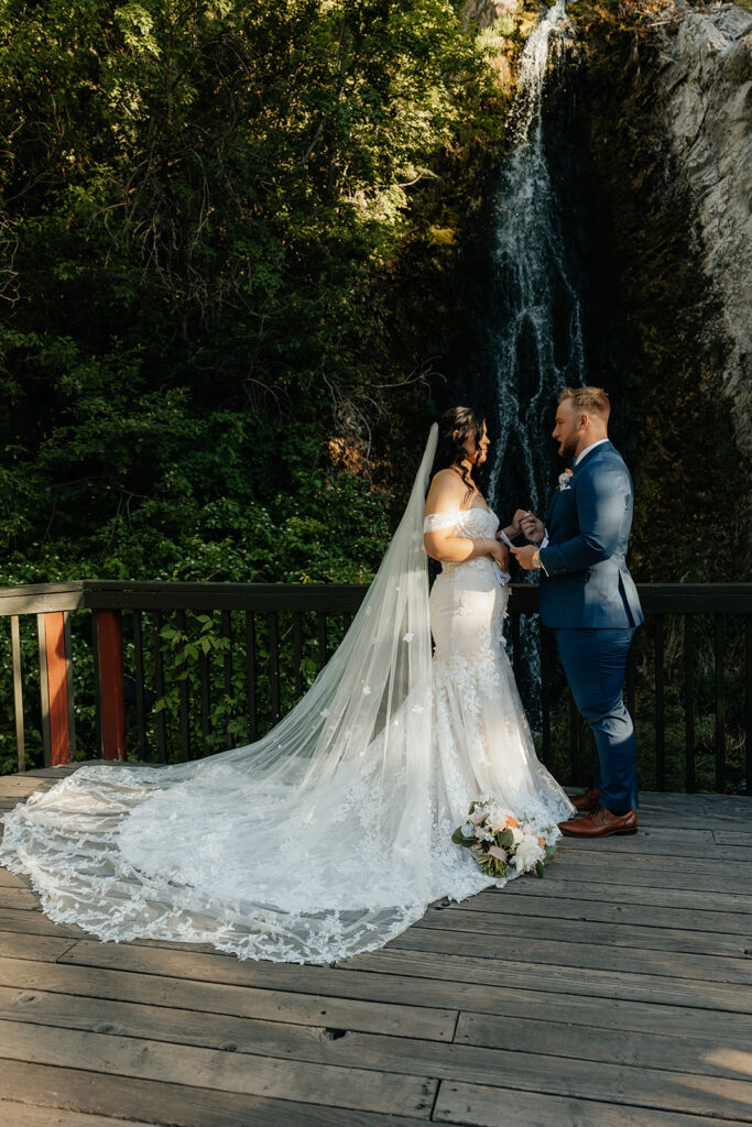 cute portrait of the newlyweds reading their private vows