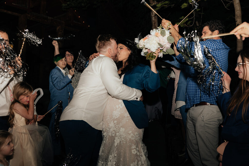 cute picture of the newlyweds kissing 