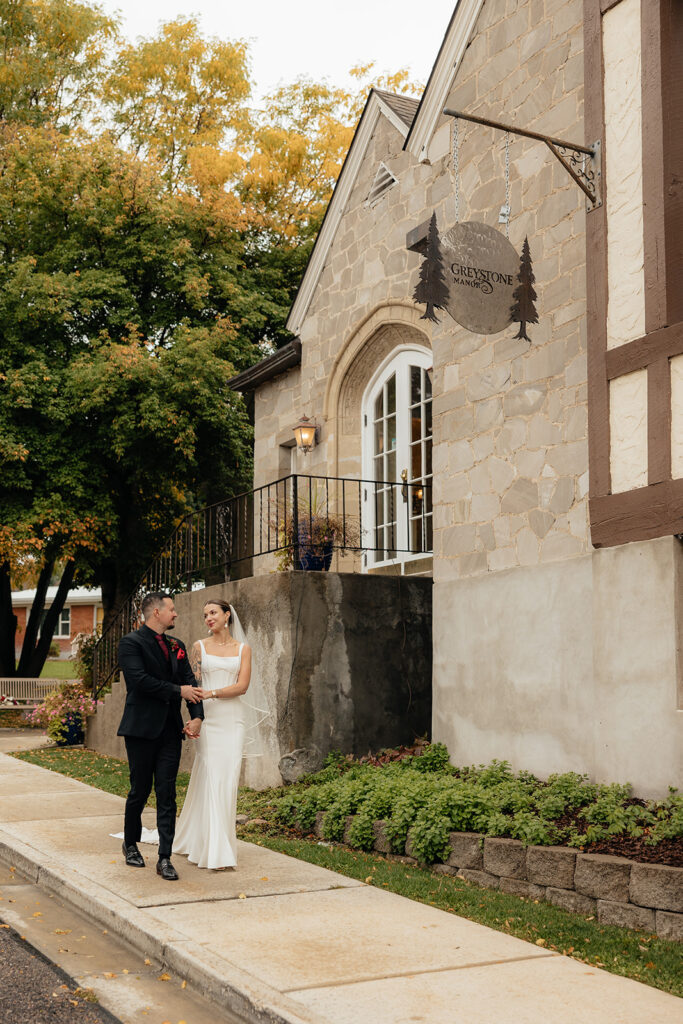 cute picture of the newlyweds before heading to their reception party