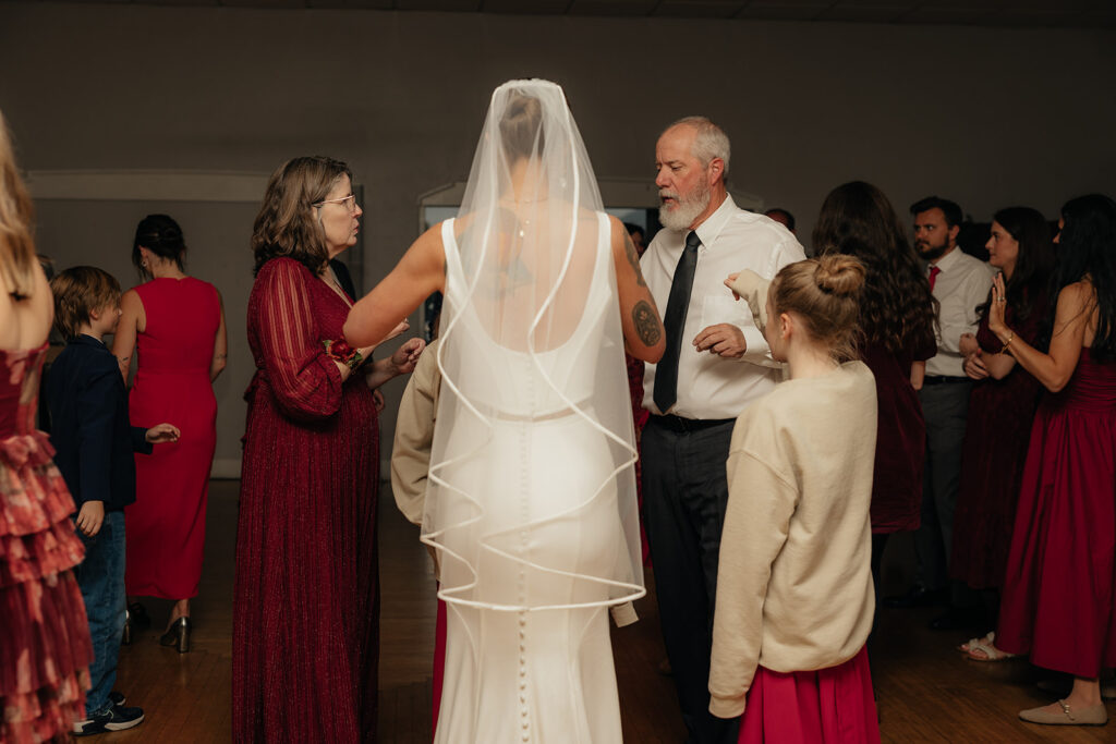bride and groom dancing at their wedding reception