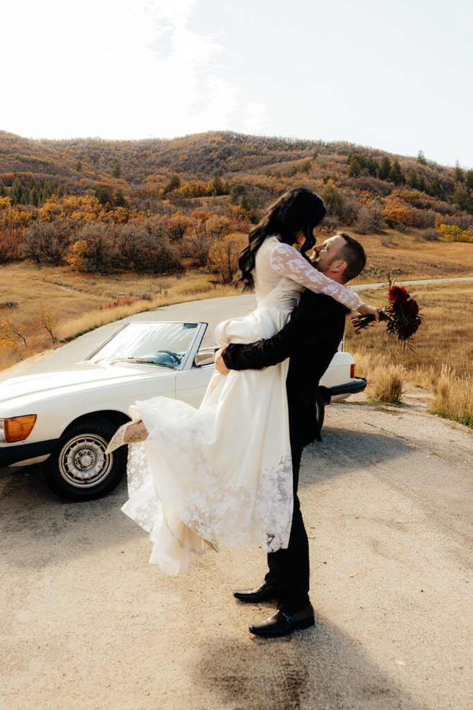 cute picture of the bride and groom kissing