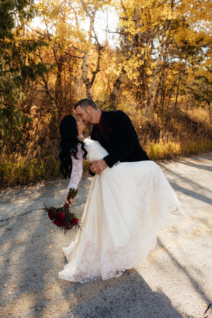 portrait of the bride and groom kissing