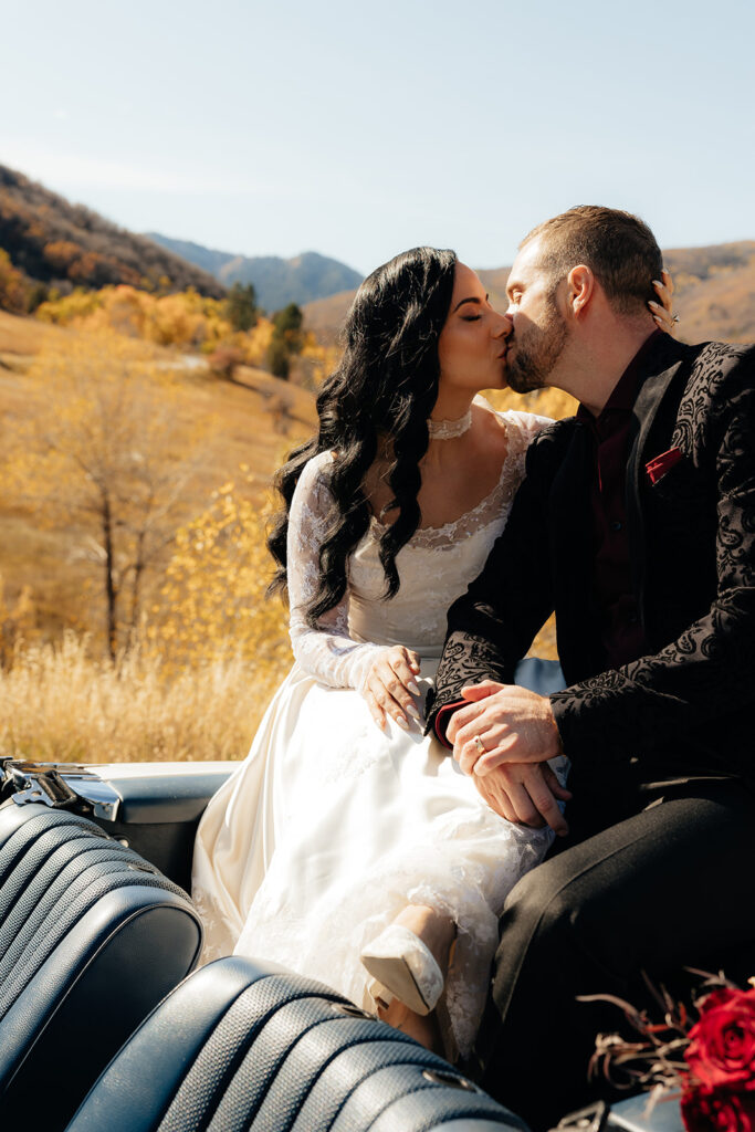 portrait of the bride and groom kissing