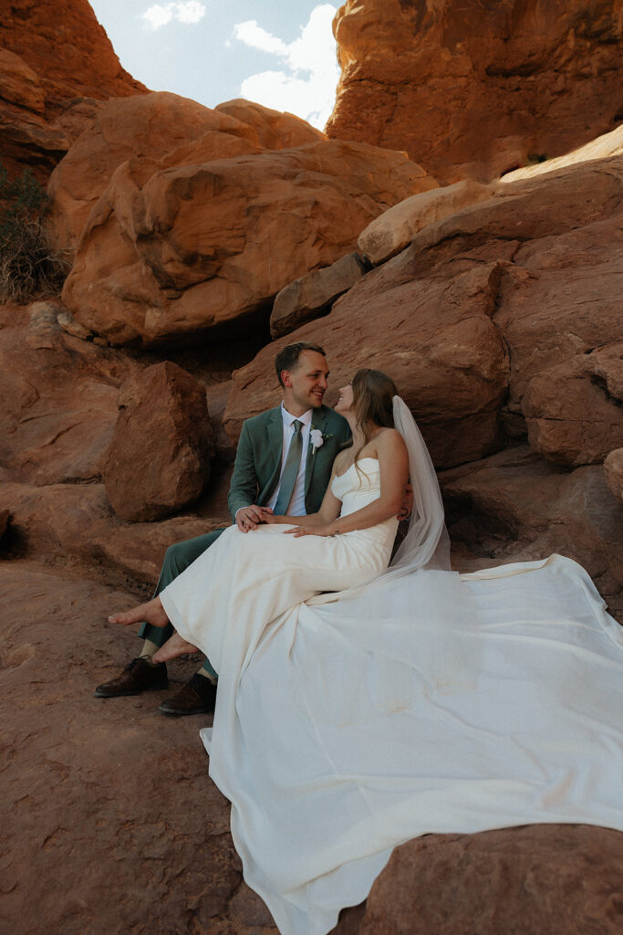Portrait of the newly married couple smiling at each other