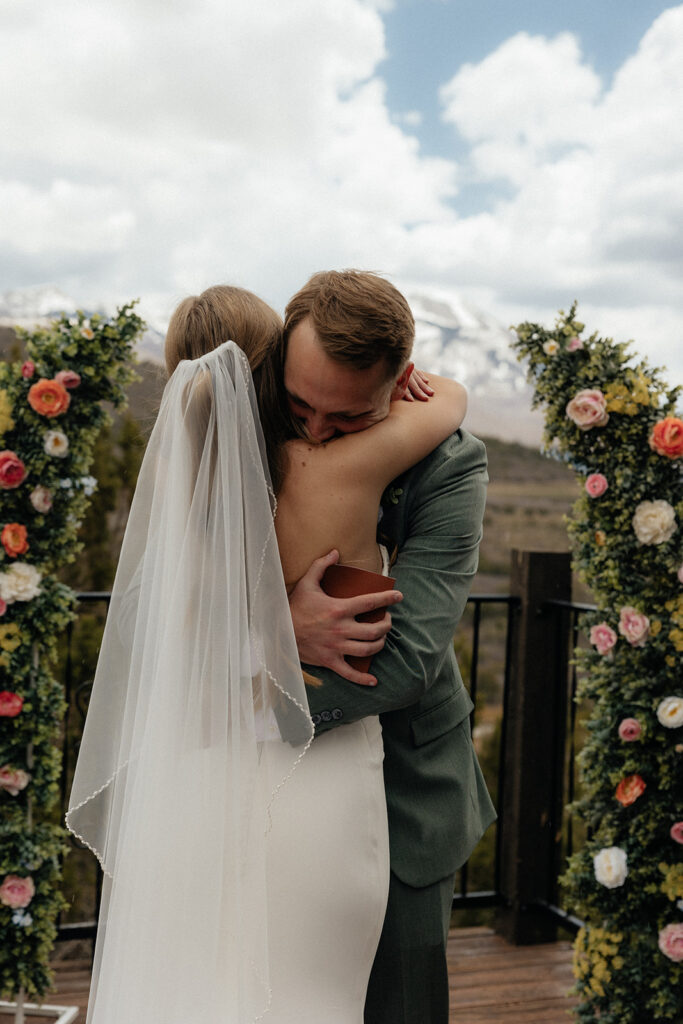Groom emotional, seeing the bride in her wedding dress