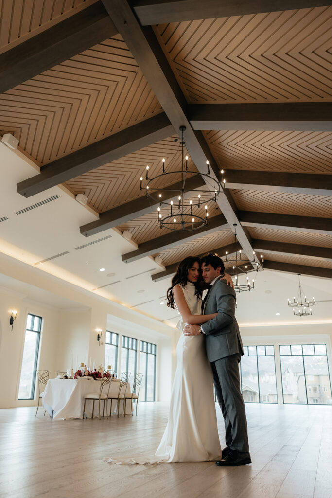 cute portrait of the bride and groom kissing