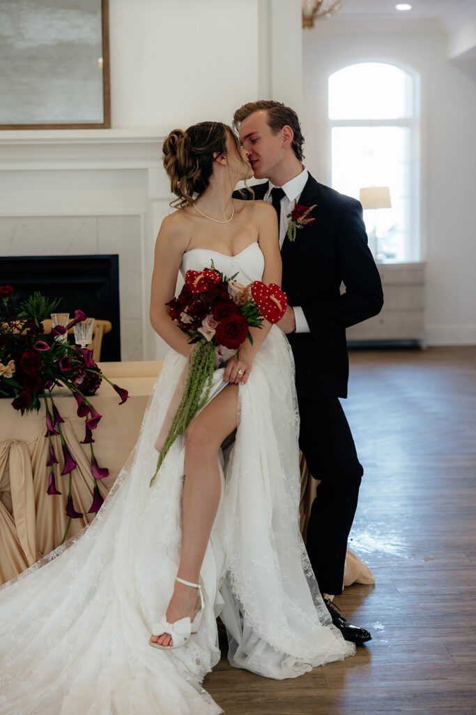 portrait of the newlyweds kissing