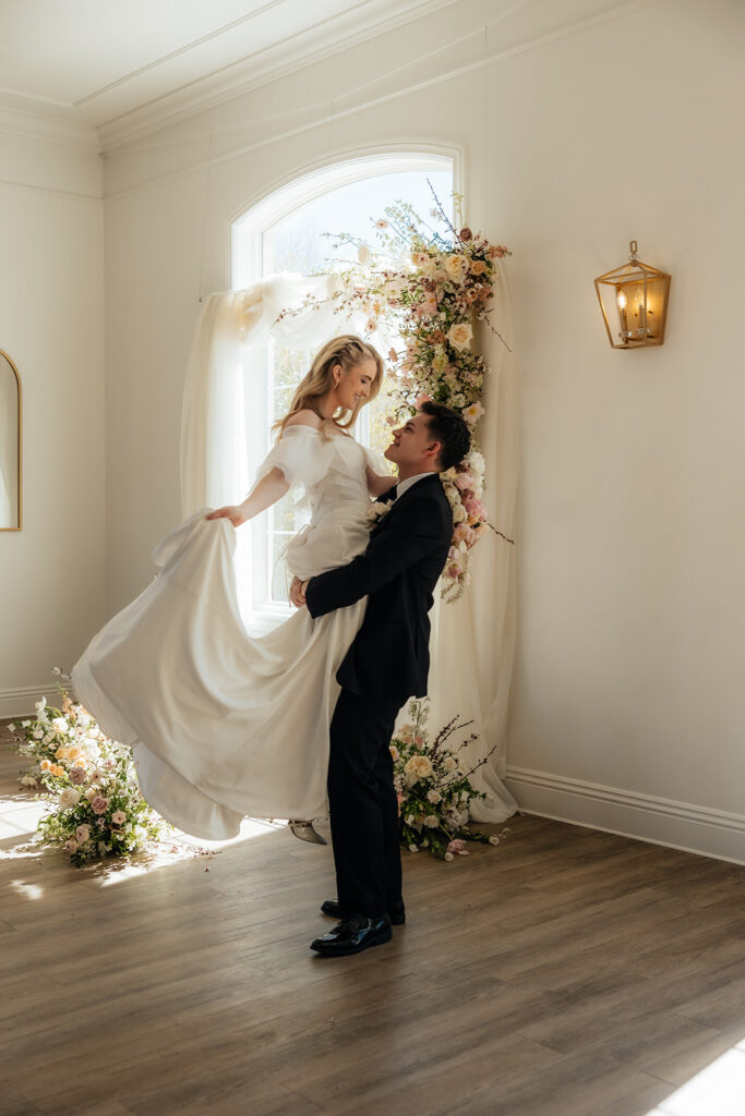 cute portrait of the bride and groom dancing