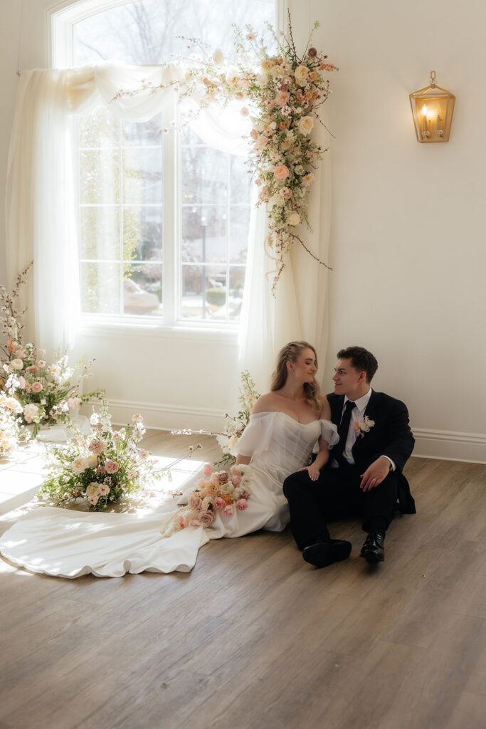 cute picture of the bride and groom smiling at each other