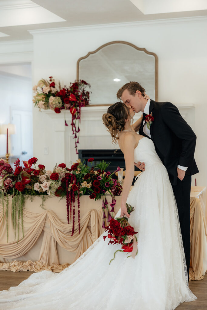 picture of the newlyweds kissing during their bridal portraits