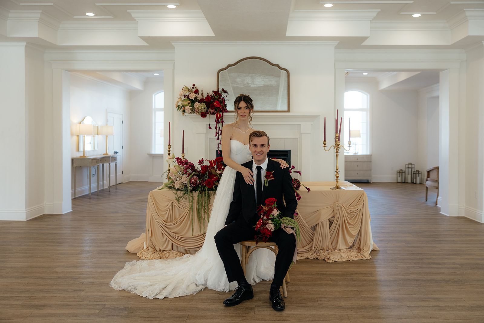 portrait of the bride and groom holding hands