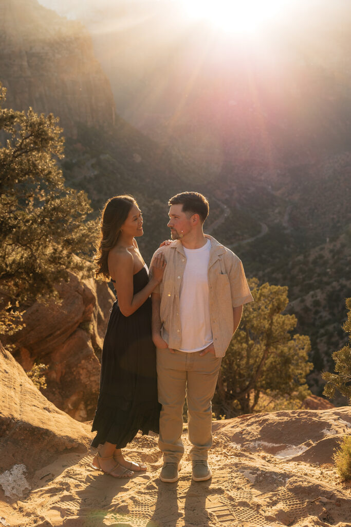 couple laughing with each other during their adventurous photoshoot