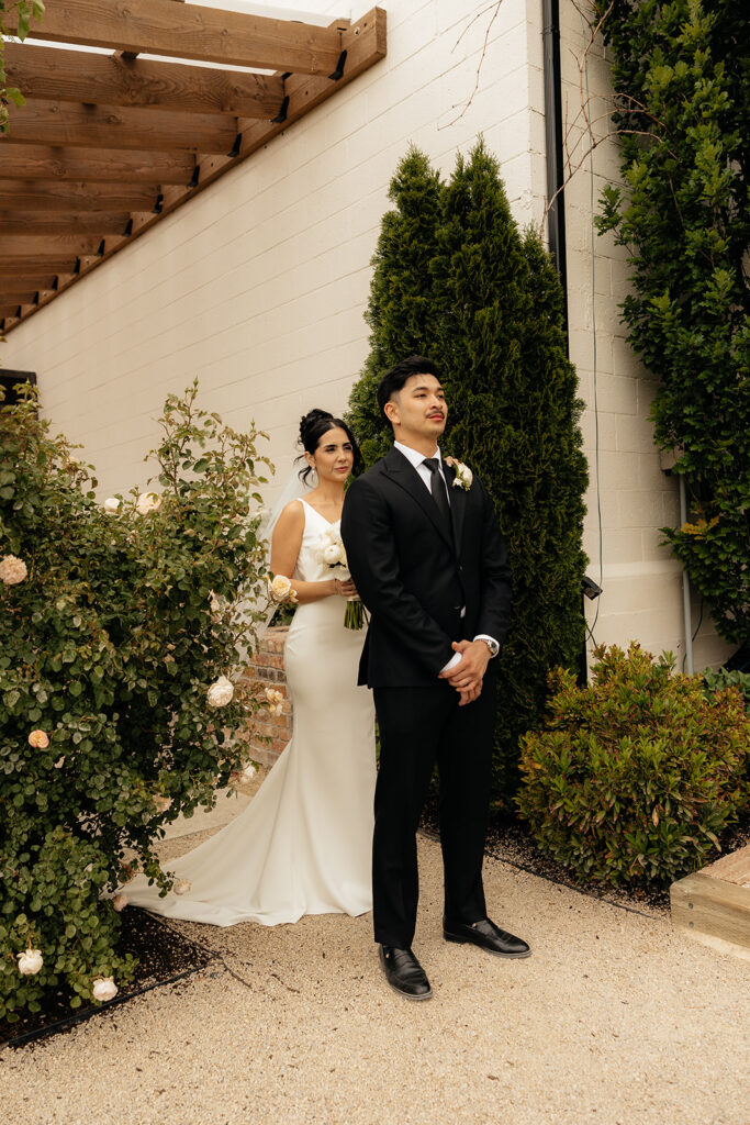 bride and groom at their first look