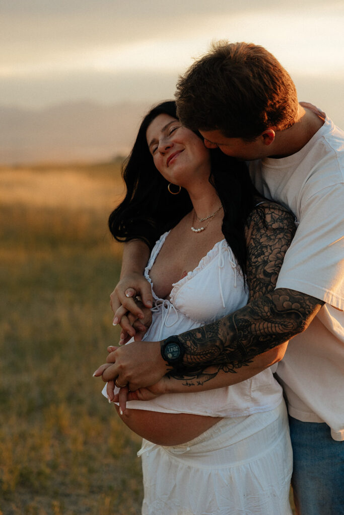 couple kissing during their photoshoot