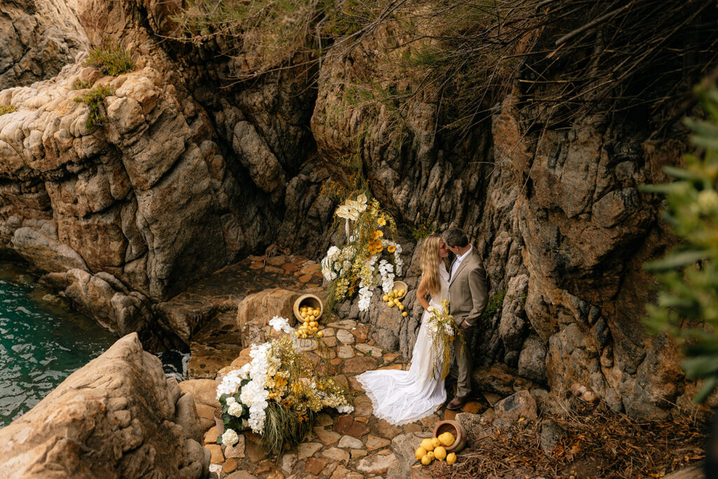 cute picture of the bride and groom kissing