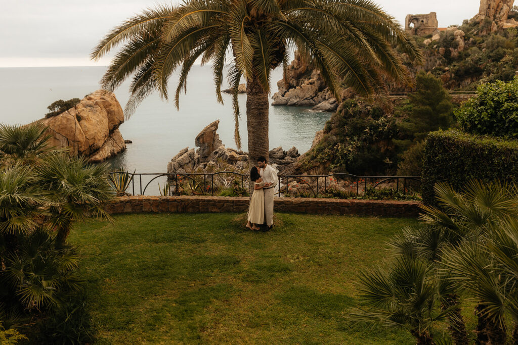 cute picture of the newly engaged couple kissing