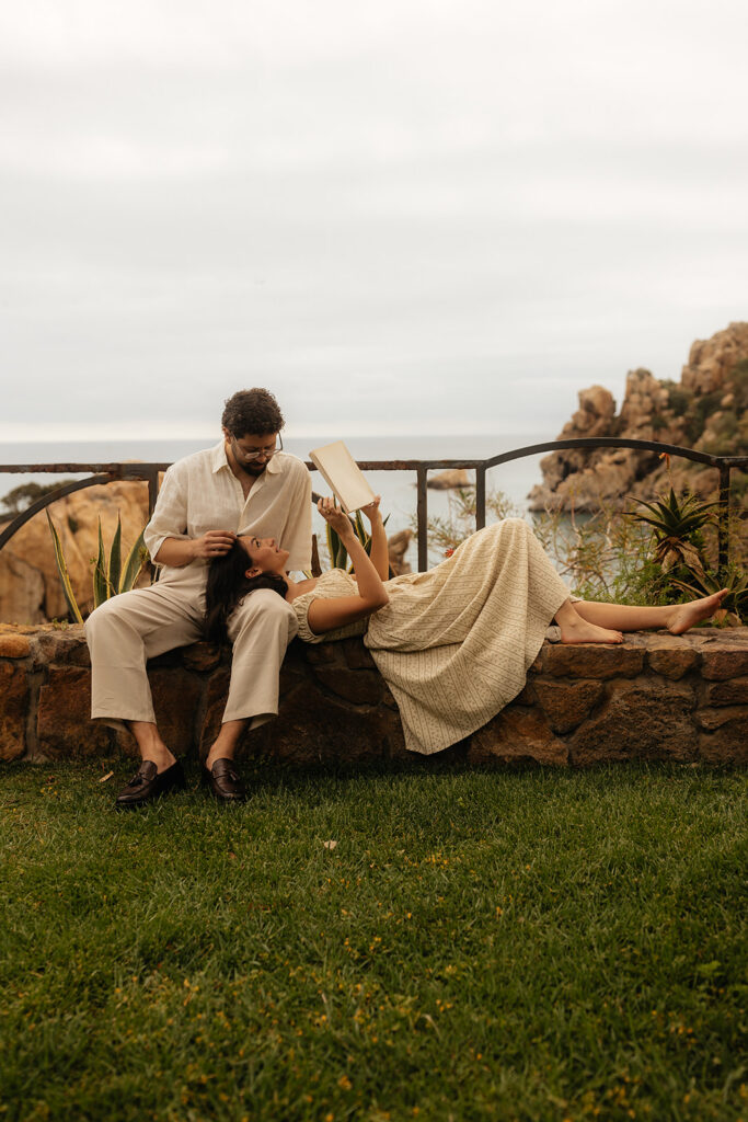 couple smiling at each other during their photoshoot
