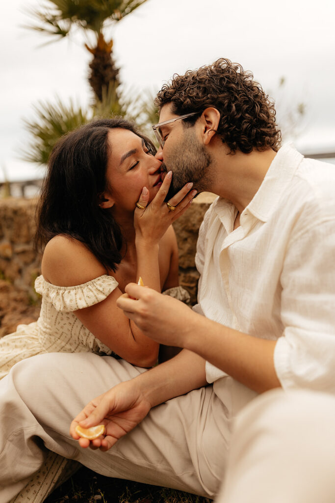 cute picture of the newly engaged kissing