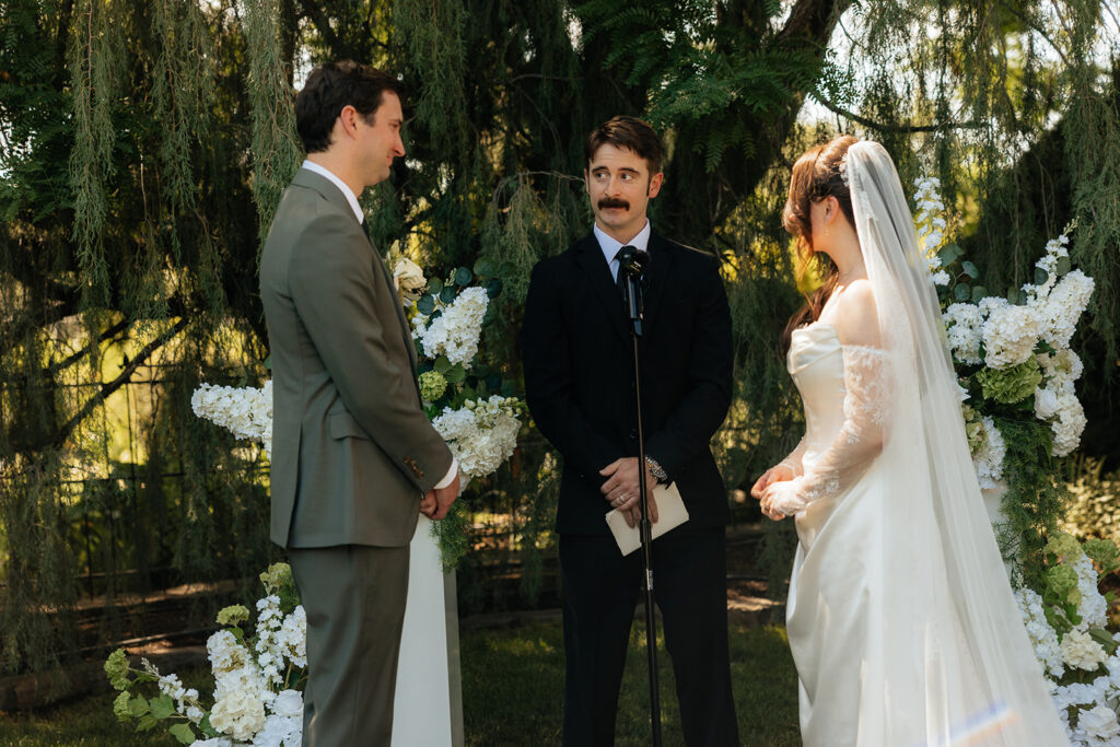 bride and groom emotional during their wedding ceremony