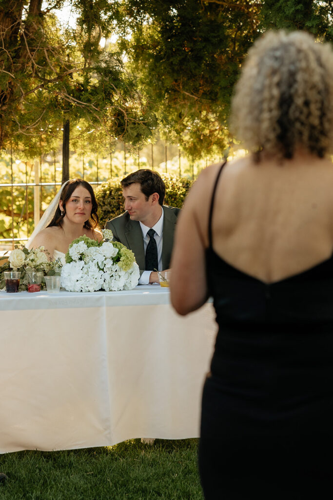 newlyweds emotional at their wedding reception